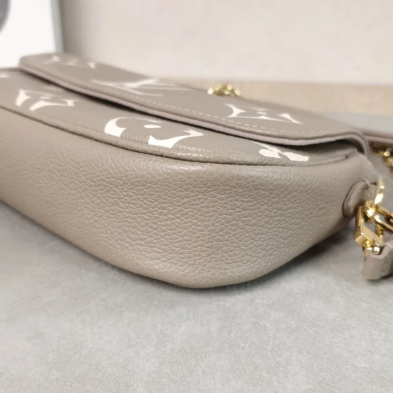 Louis Vuitton Crossbody Bag IVY Empreinte Embossed Calfskin Small 23.5 × 4.3 × 12 cm — detail view 11 of 11