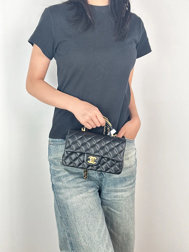 Chanel Crossbody Bag mini Black Lambskin mini20 × 6 × 12 cm — on-model view 3 of 3