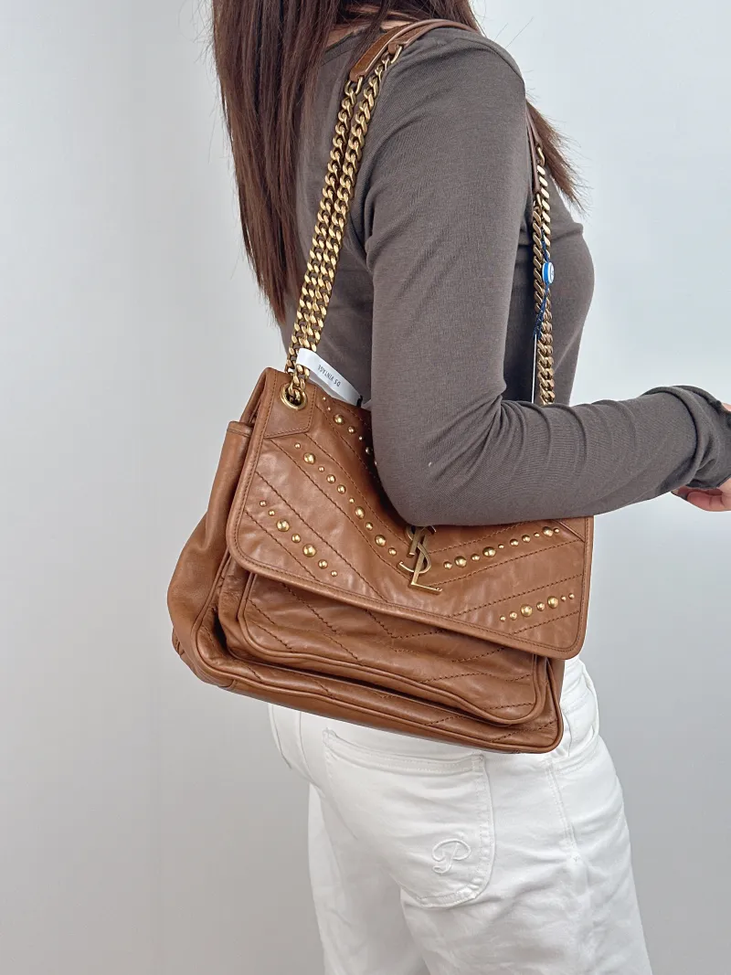 SAINT LAURENT Crossbody Bag Niki Caramel Medium 28 × 8.5 × 20 cm — on-model view 2 of 2