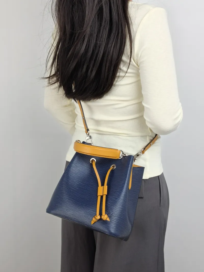Louis Vuitton Crossbody Bag NÉONOÉ Bucket Bag BB Blue · Yellow Epi Embossed Calfskin BB 20 × 13 × 20 cm — on-model view 2 of 3