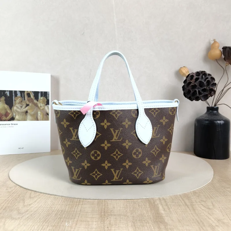 Louis Vuitton Crossbody Bag NEVERFULL INSIDE OUT BB Blue PVC · Calfskin BB 26.5 × 11 × 16.5 cm