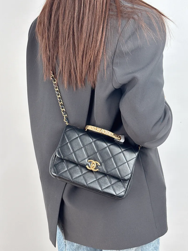 Chanel Crossbody Bag 24c mini Black Lambskin One Size 20.5 × 6 × 14 cm — on-model view 2 of 3