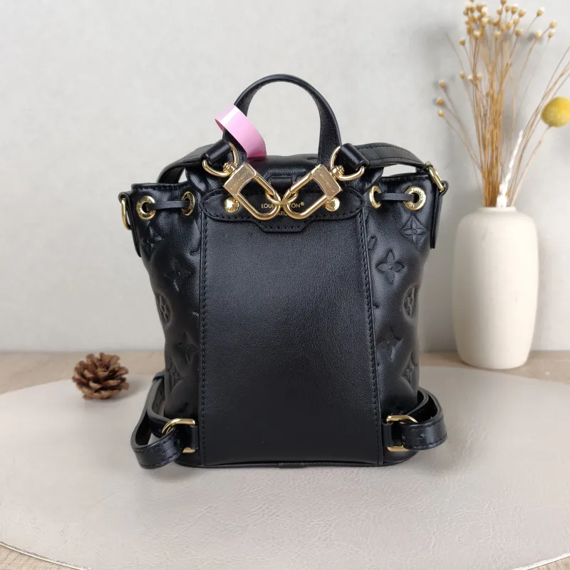 Louis Vuitton Backpack Coussin Backpack Black with Gold-Tone Hardware Lambskin Mini 15 × 7.5 × 20 cm — cover view 4 of 5