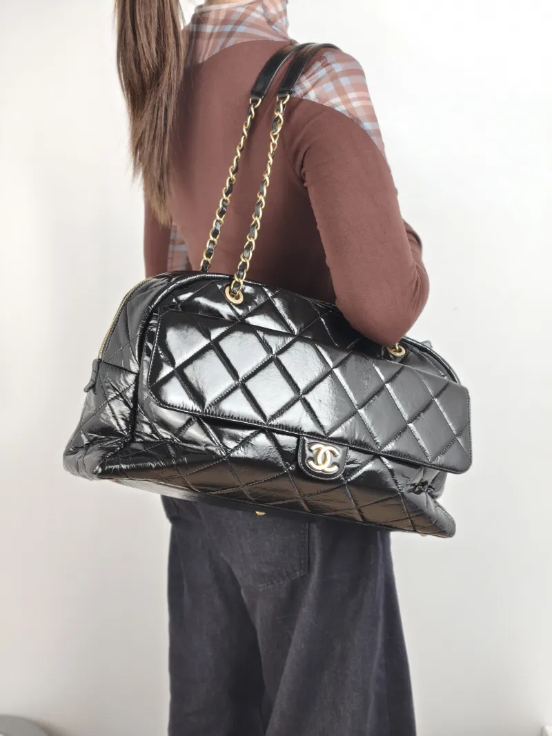 Chanel Crossbody Bag Bowling Bag Black Waxed Leather One Size 42 × 15 × 27 cm — on-model view 1 of 2