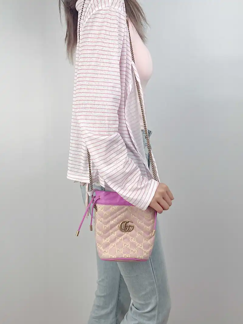 GUCCI Crossbody Bag GG Marmont Marmont Bucket Bag Canvas Calfskin mini14 × 13 × 17 cm — on-model view 1 of 2