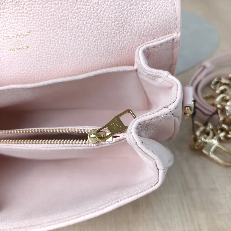 Louis Vuitton Crossbody Bag Pochette Métis East West Monogram Empreinte Embossed Calfskin Small 21.5 × 6 × 13.5 cm — detail view 14 of 14