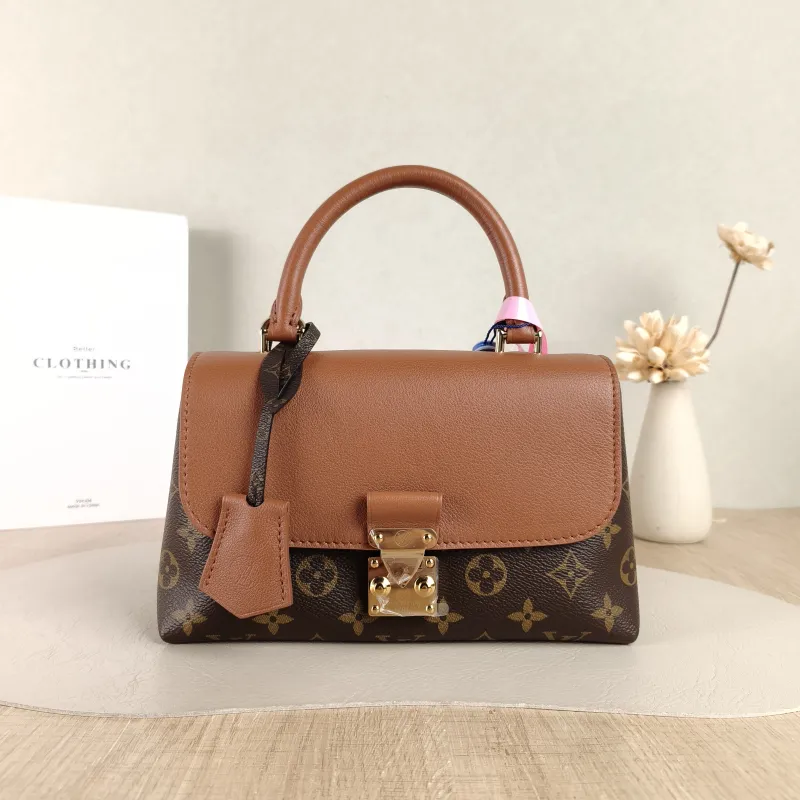 Louis Vuitton Crossbody Bag MADELEINE PVC · Calfskin BB 24.5 × 8 × 16 cm