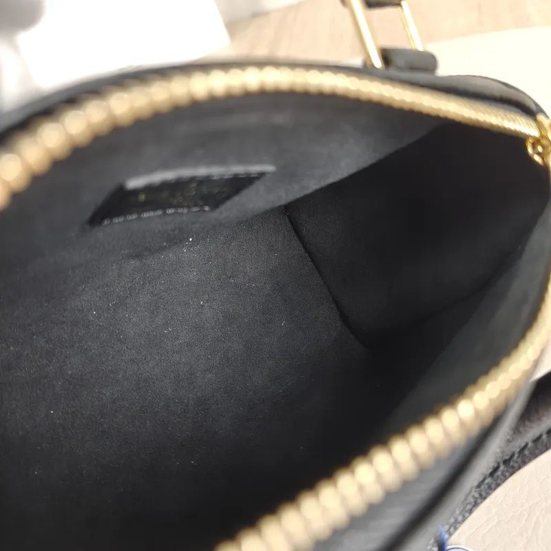 Louis Vuitton Crossbody Bag Speedy Nano Black · White Empreinte Embossed Calfskin nano 16 × 7.5 × 10 cm — detail view 7 of 9