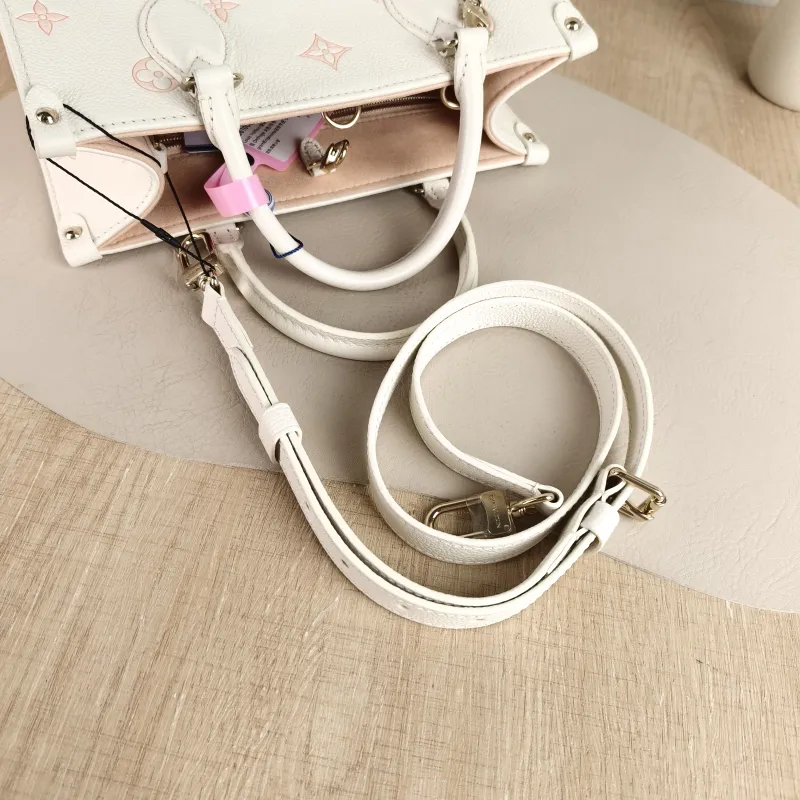 Louis Vuitton Shoulder Bag Onthego Beige · Pink Monogram Empreinte Embossed Calfskin Small 25 × 11.5 × 19 cm — detail view 8 of 12
