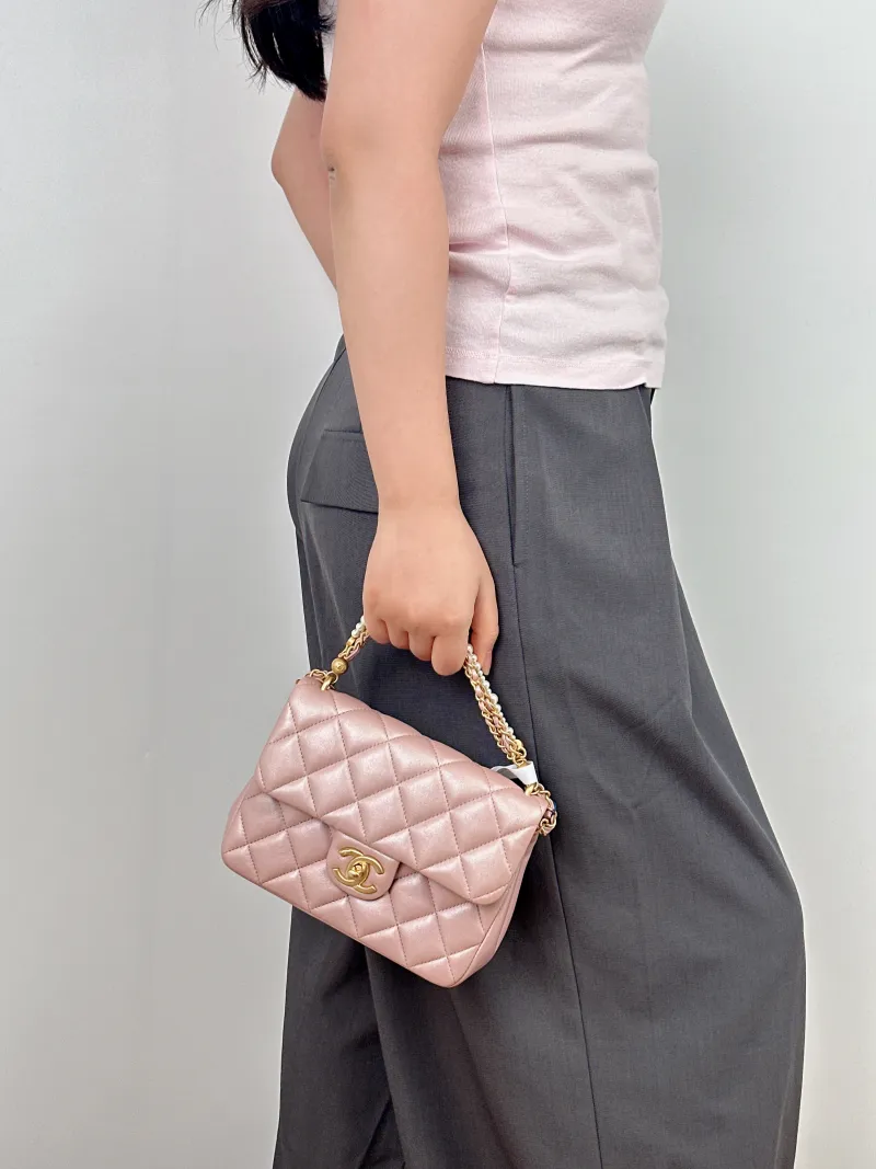 Chanel Crossbody Bag Pearl Lambskin One Size19.5 × 7.5 × 14.5 cm — on-model view 1 of 2