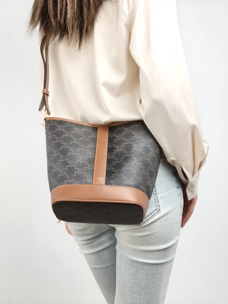 CELINE Crossbody Bag Triomphe Bucket Bag Monogram PVC Small 22 × 13 × 26 cm — on-model view 2 of 2