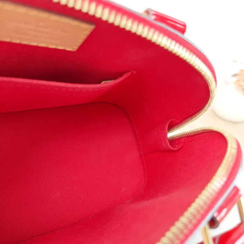 Louis Vuitton Crossbody Bag Alma BB Patent Leather BB 23.5 × 11.5 × 17.5 cm — detail view 7 of 11