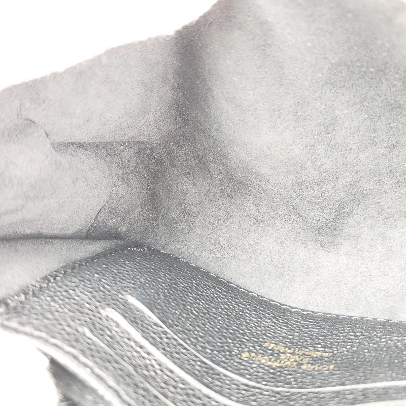 Louis Vuitton Crossbody Bag MADELEINE Black Monogram Empreinte Embossed Calfskin nano 21 × 6 × 12.5 cm — detail view 1 of 11