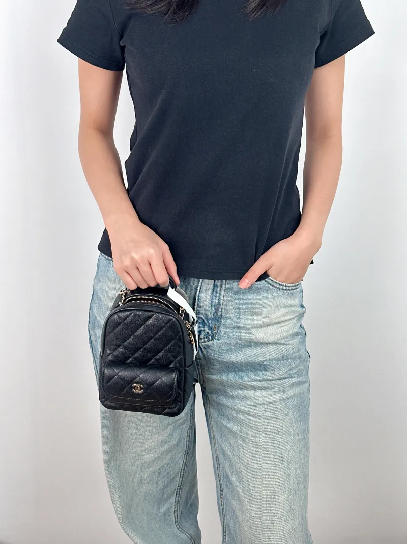 Chanel Crossbody Bag Mini Backpack Crossbody Bag Black Grained Calfskin One Size 13 × 9 × 18 cm — on-model view 2 of 3