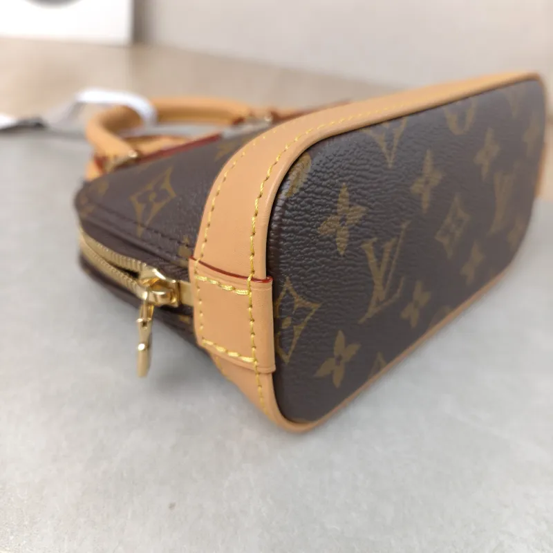 Louis Vuitton Crossbody Bag Alma Nano Monogram PVC nano 18 × 8 × 12 cm — detail view 5 of 10