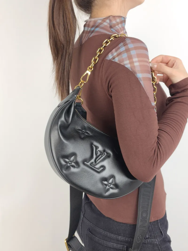 Louis Vuitton Crossbody Bag Over The Moon Black Calfskin 27.5 × 7 × 16 cm — on-model view 2 of 2