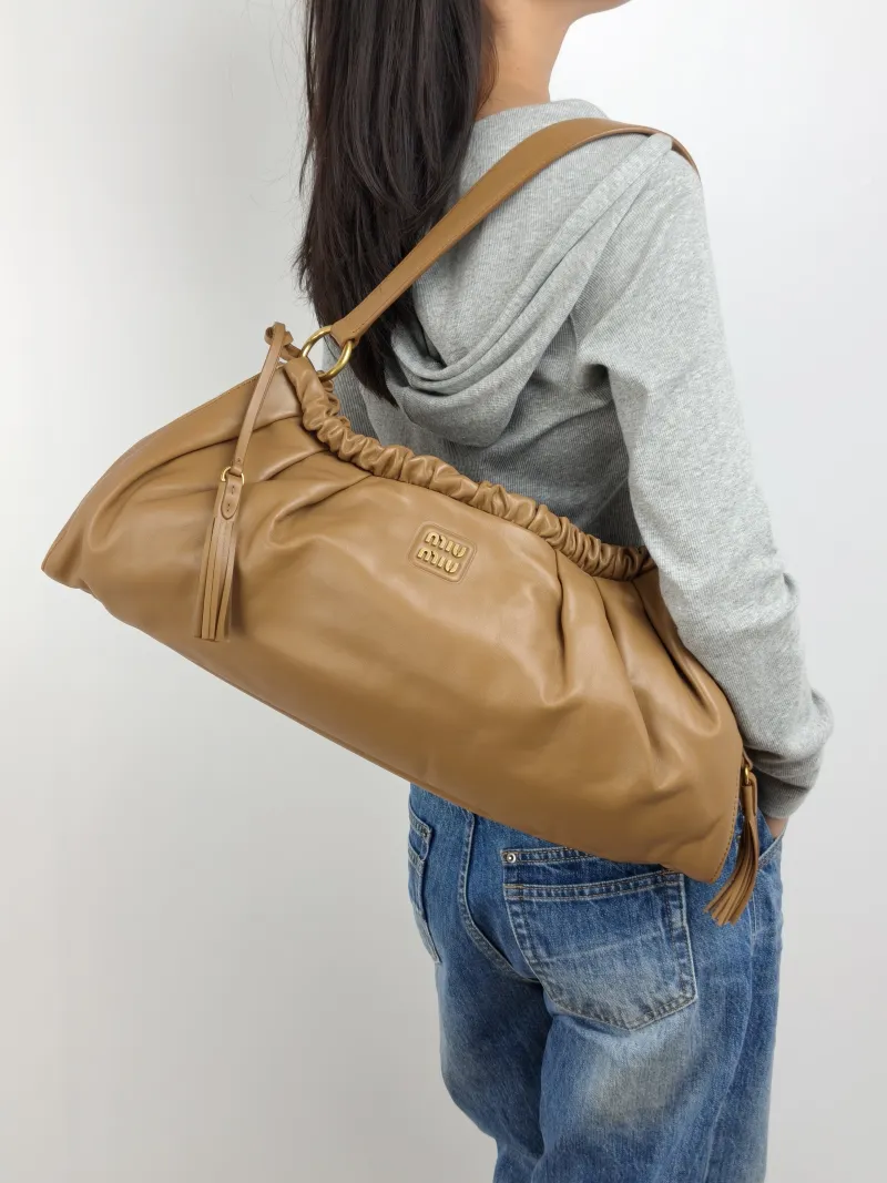 Miumiu Shoulder Bag Joie Shoulder Bag Caramel Lambskin One Size 52 × 10 × 23 cm — on-model view 2 of 2