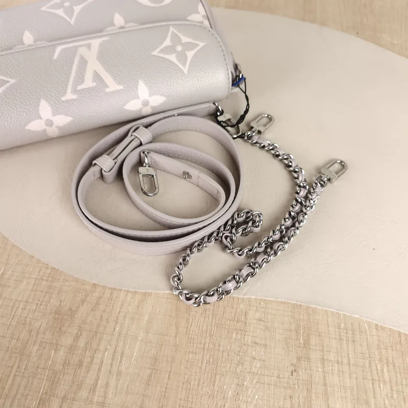Louis Vuitton Crossbody Bag IVY Grey · White Monogram Empreinte Embossed Calfskin Small 23.5 × 4.3 × 12 cm — detail view 5 of 11