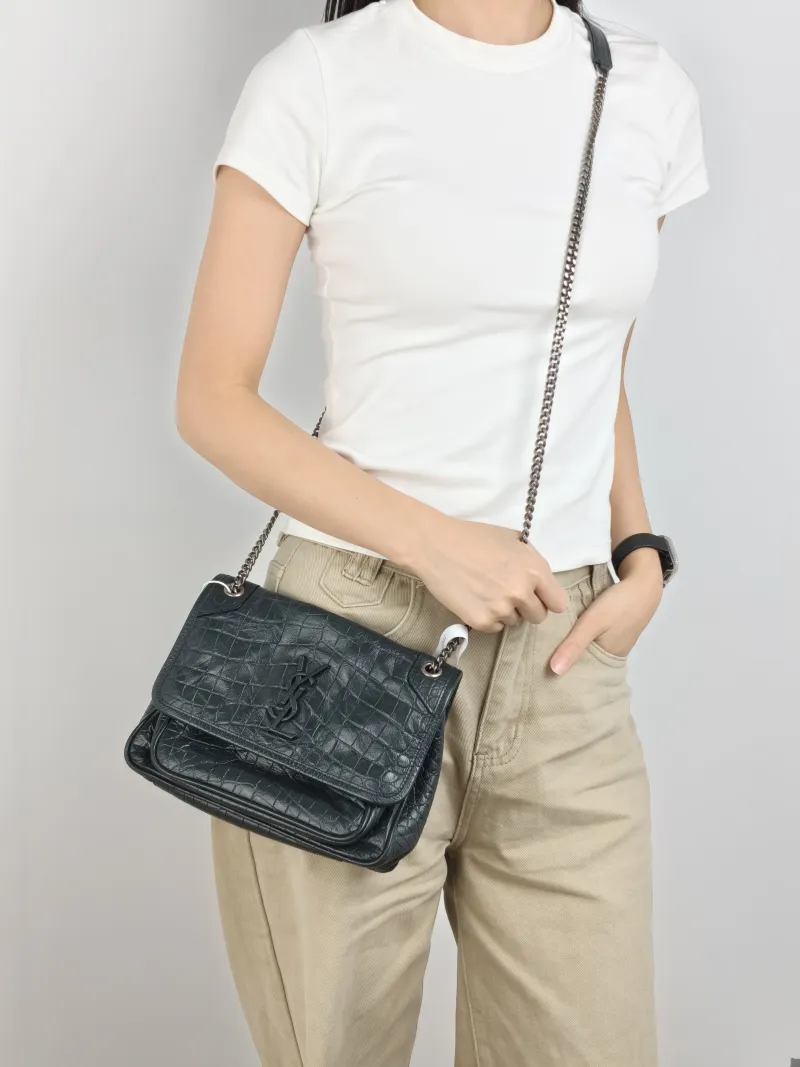 SAINT LAURENT Crossbody Bag Niki D Green Waxed Leather Small 21 × 7.5 × 16 cm — on-model view 2 of 2