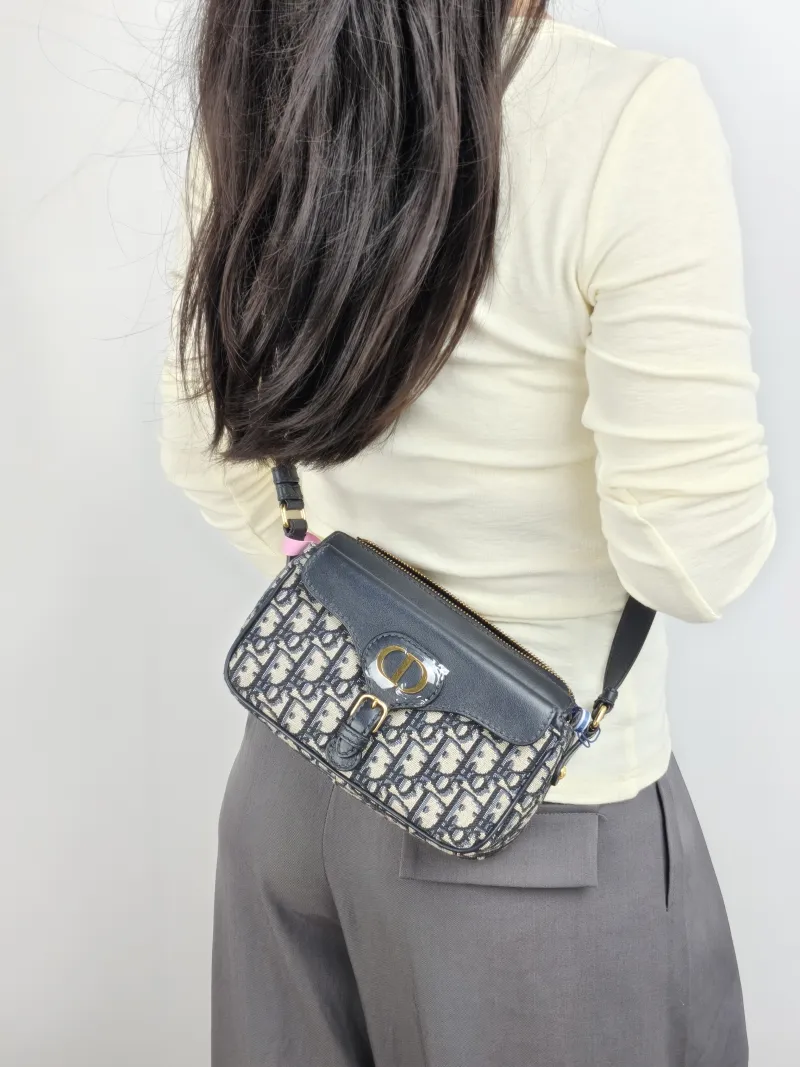 DIOR Crossbody Bag 30Montaigne Blue Canvas Small 19.5 × 6.5 × 11 cm — on-model view 2 of 2