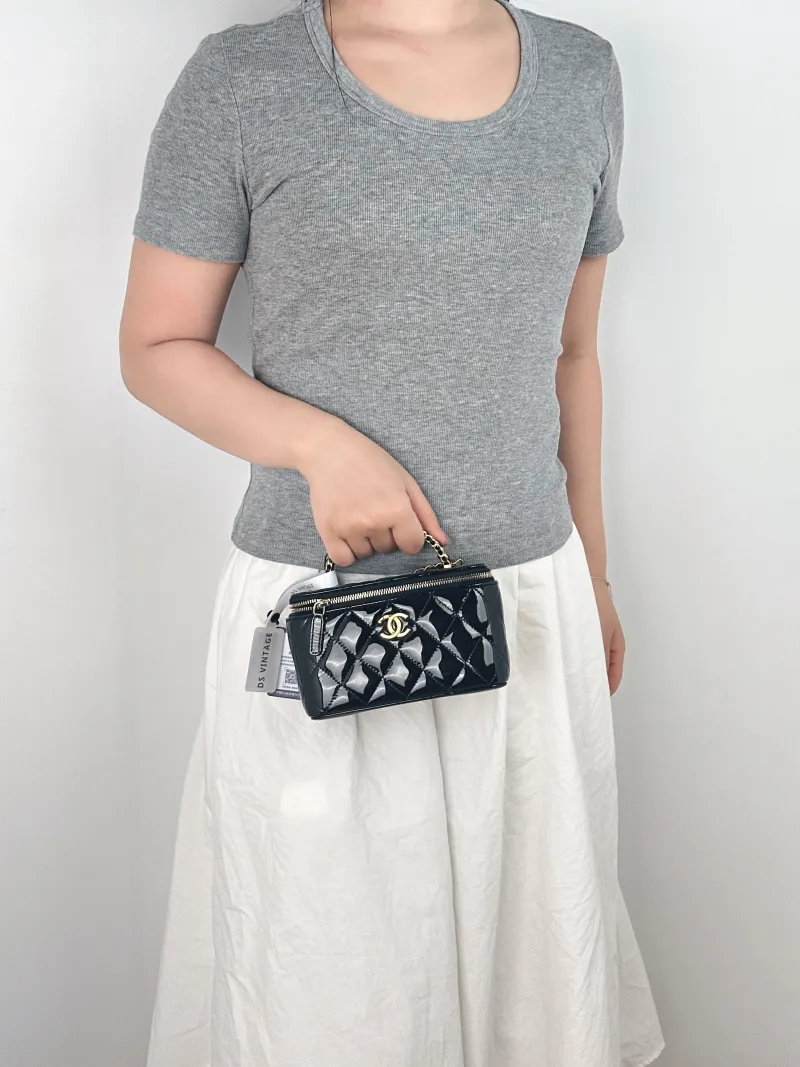 Chanel Crossbody Bag Edition Black Patent Leathermini16 × 8 × 9.5 cm — on-model view 2 of 3