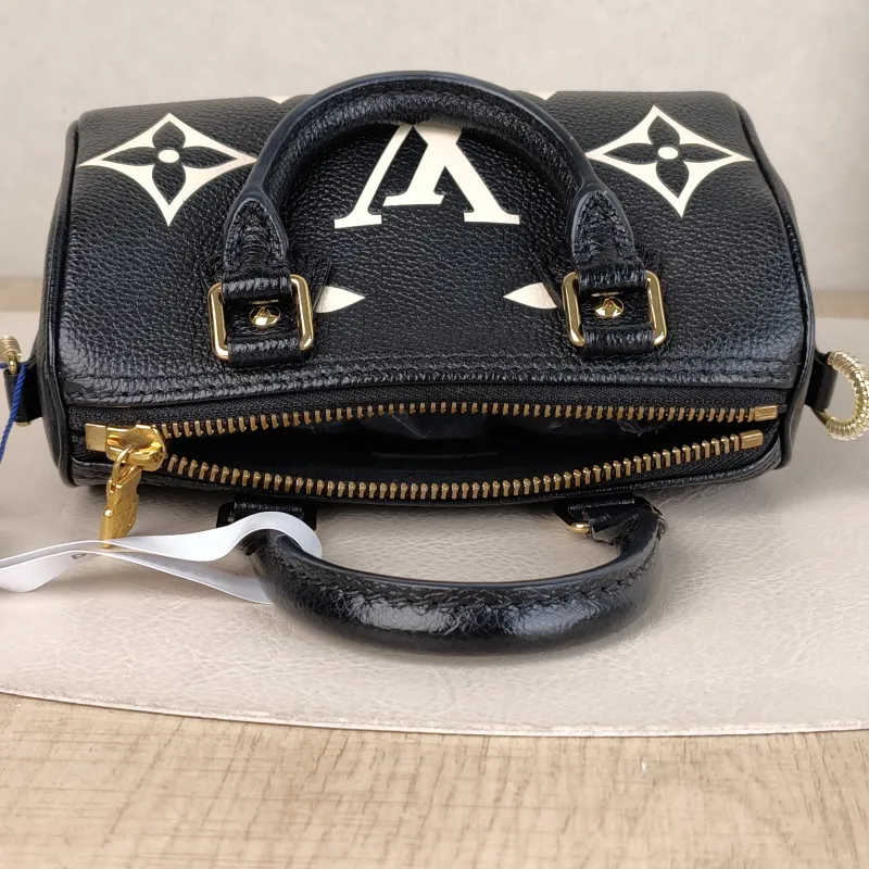 Louis Vuitton Crossbody Bag Speedy Nano Black · White Empreinte Embossed Calfskin Monogramnano16 × 7.5 × 10 cm — detail view 2 of 13