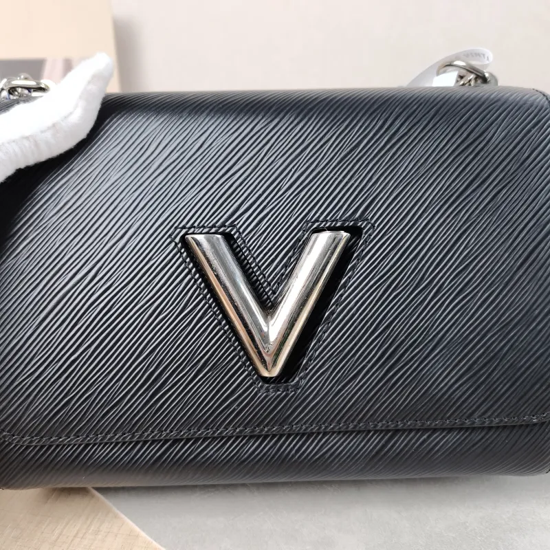 Louis Vuitton Crossbody Bag Twist Black Epi Embossed Calfskin Medium 23 × 9.5 × 17 cm — detail view 1 of 12