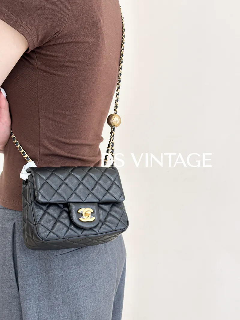 Chanel Crossbody Bag Classic Flap Mini CF Mini Black with Gold-Tone Hardware SL ambskin Mini 17 × 8 × 13.5 cm — on-model view 2 of 3