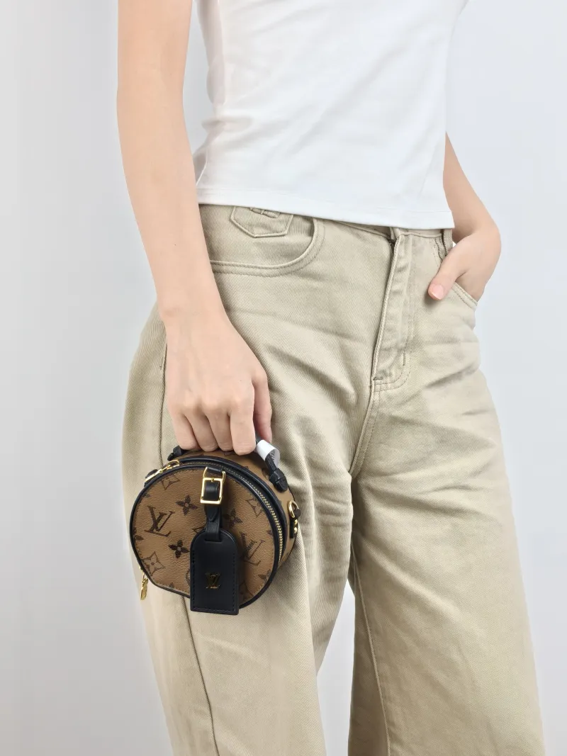 Louis Vuitton Crossbody Bag Mini BOITE CHAPEAU Monogram PVC Mini 13 × 6.5 × 12 cm — on-model view 2 of 3