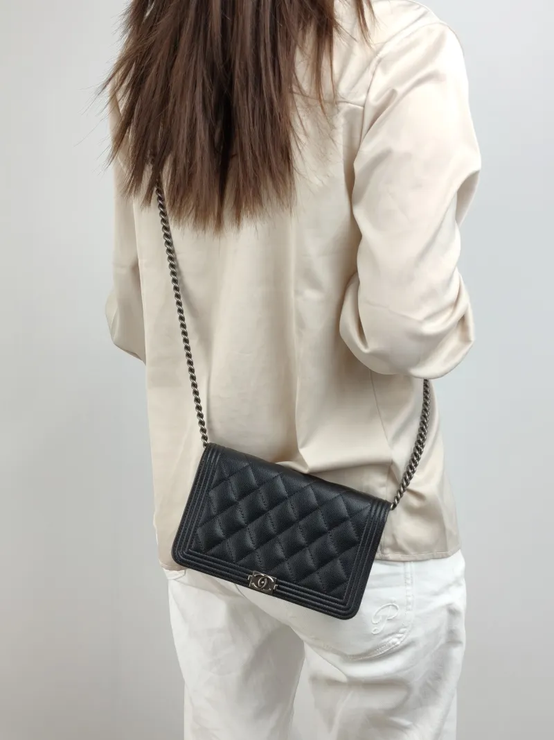 Chanel Crossbody Bag Le Boy​ WOC Black Grained Calfskin Mini 19.2 × 3.5 × 12.3 cm — on-model view 2 of 2