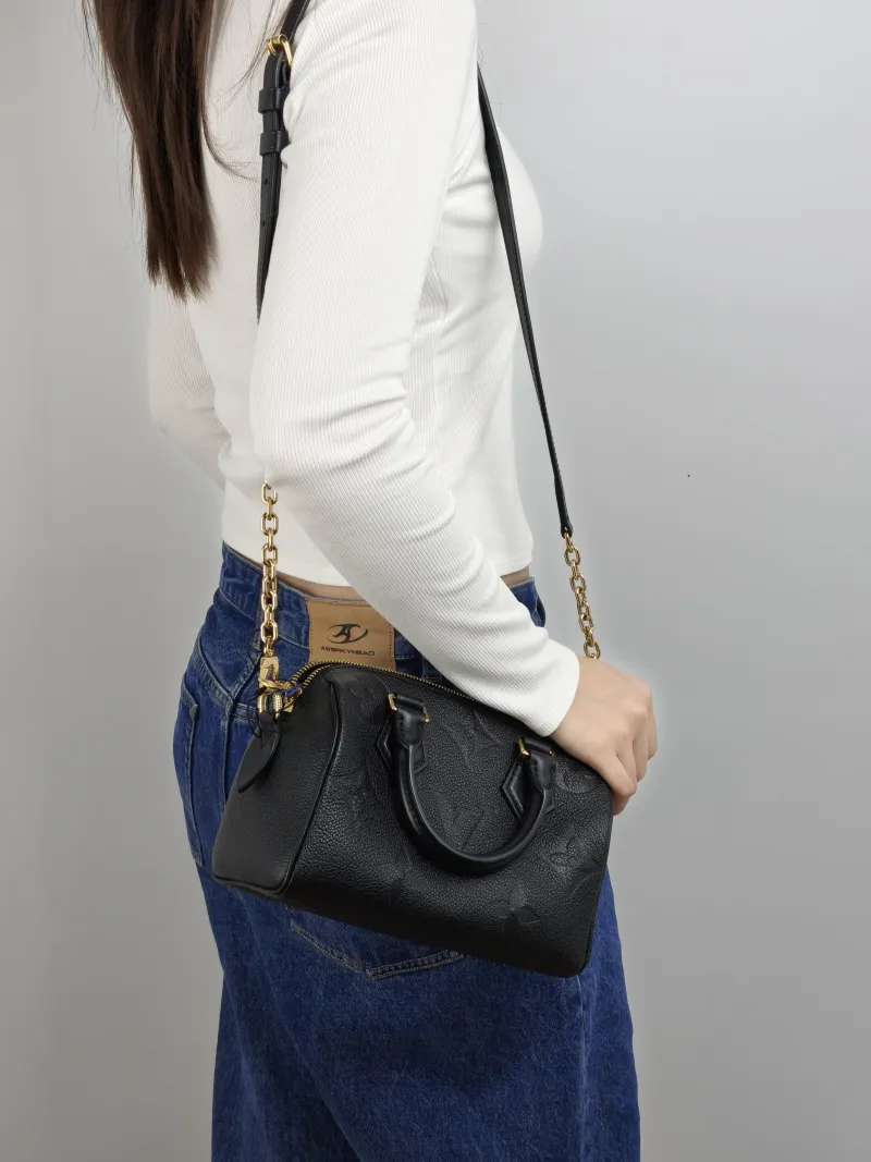 Louis Vuitton Crossbody Bag Speedy20 Black Monogram Empreinte Embossed Calfskin Small 20.5 × 12 × 13.5 cm — on-model view 2 of 3