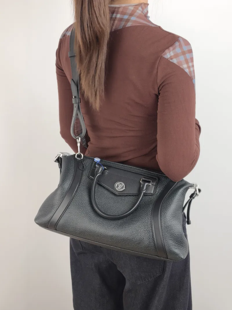Louis Vuitton Crossbody Bag BIKER Black Lambskin Medium 38 × 15 × 15 cm — on-model view 1 of 3