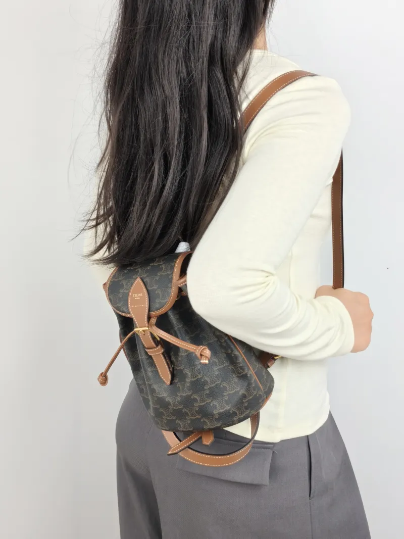 CELINE Backpack FOLCO Backpack Monogram PVC Mini 17 × 10 × 20 cm — on-model view 1 of 2