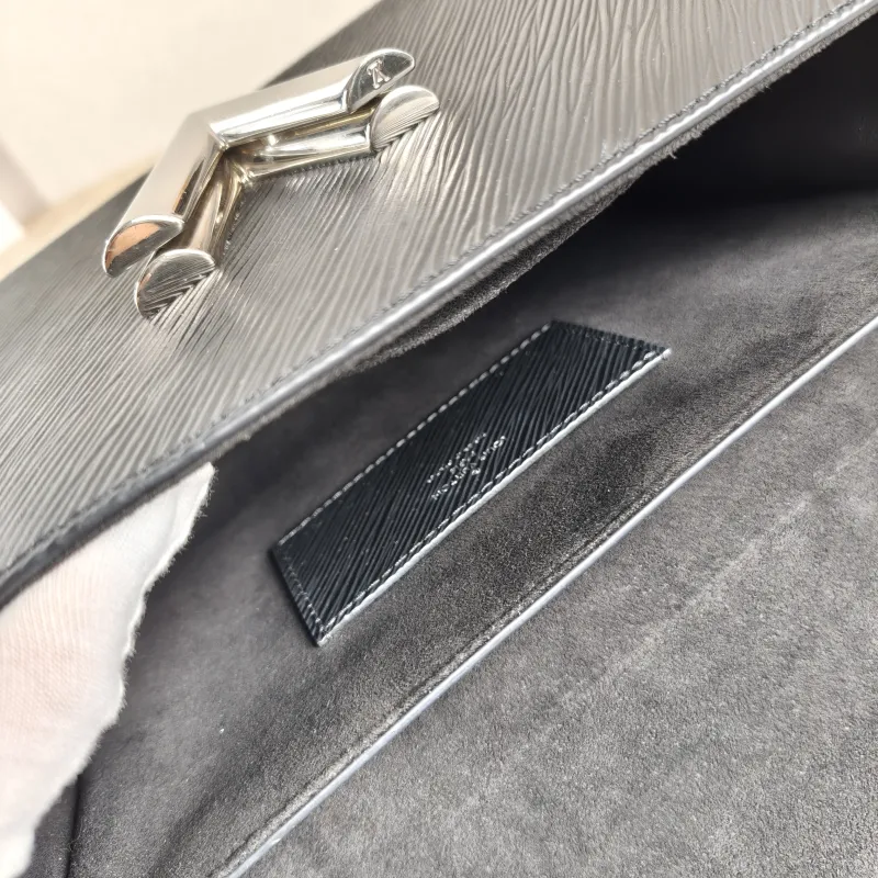 Louis Vuitton Crossbody Bag Twist Black Epi Embossed Calfskin Medium 23 × 9.5 × 17 cm — detail view 1 of 13
