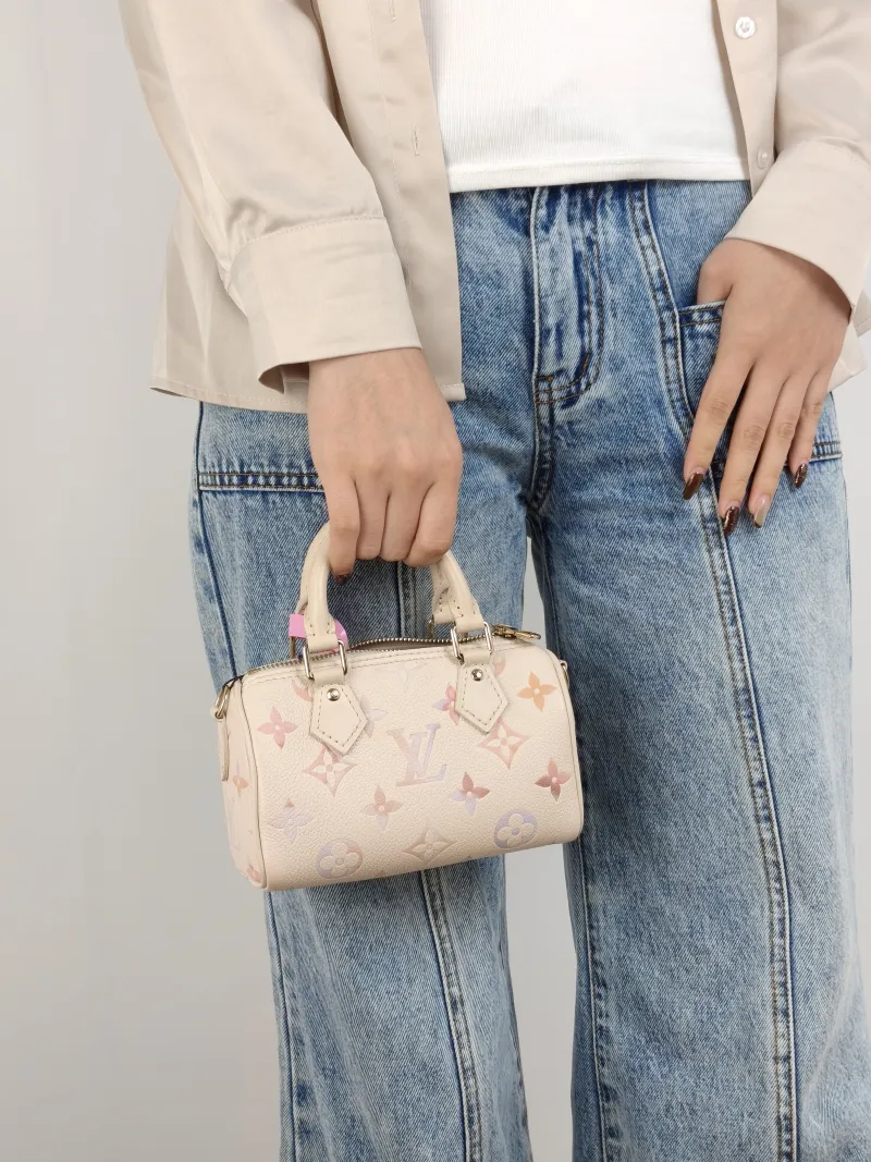 Louis Vuitton Crossbody Bag Speedy Nano Calfskin nano 16 × 7.5 × 10 cm — on-model view 2 of 3
