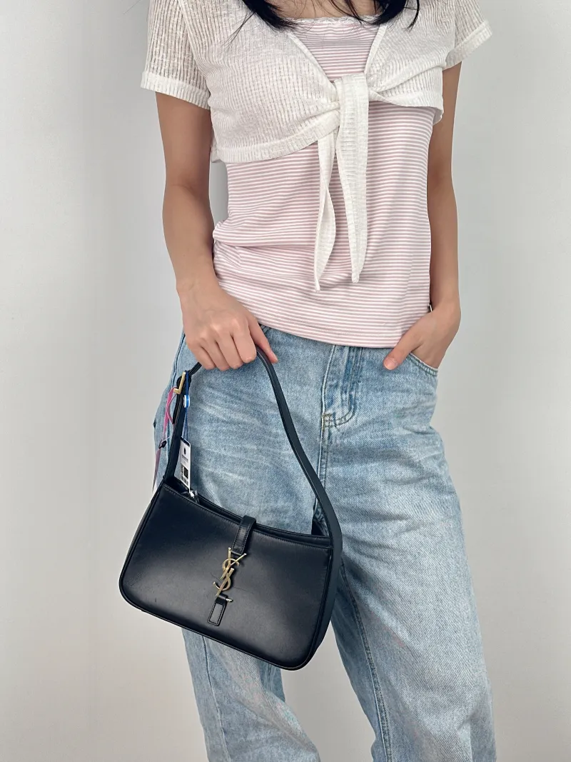 SAINT LAURENT Shoulder Bag LE 5 À 7 Black Calfskin Small 23 × 6.5 × 16 cm — on-model view 1 of 2