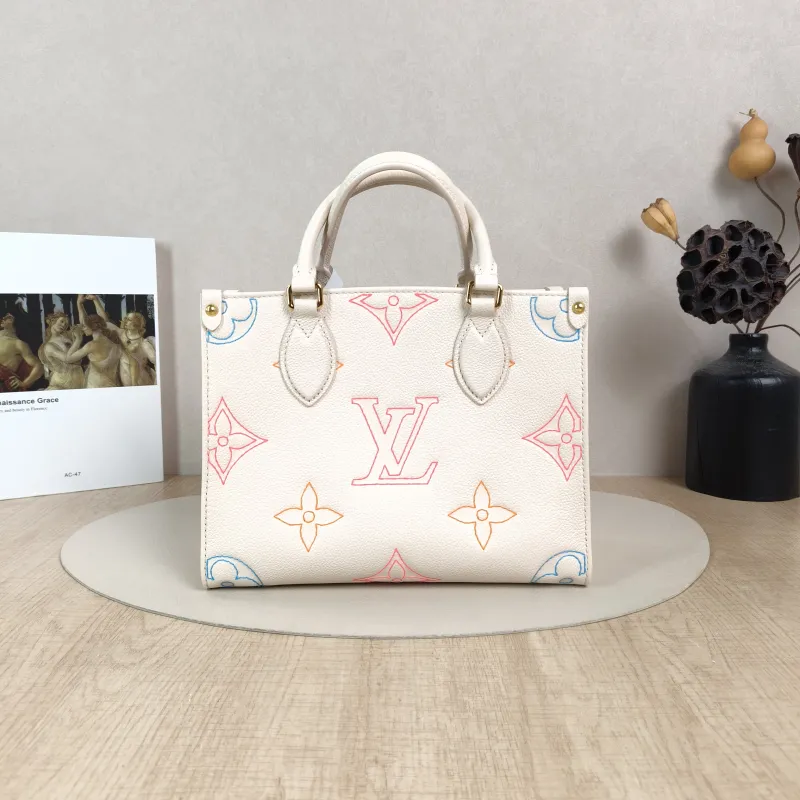 Louis Vuitton Top Handle Bag Onthego White · Embroidered Calfskin Small25 × 11.5 × 19 cm — cover view 5 of 5