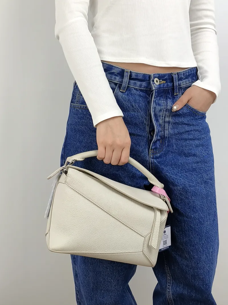LOEWE Crossbody Bag Puzzle White CC alfskin Small 24 × 10.5 × 16.5 cm — on-model view 2 of 3