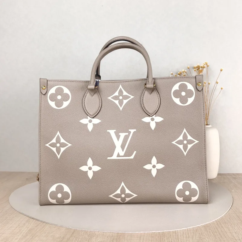 Louis Vuitton Shoulder Bag Onthego Medium · White Monogram Empreinte Embossed Calfskin Medium 35 × 14 × 27 cm — cover view 2 of 5