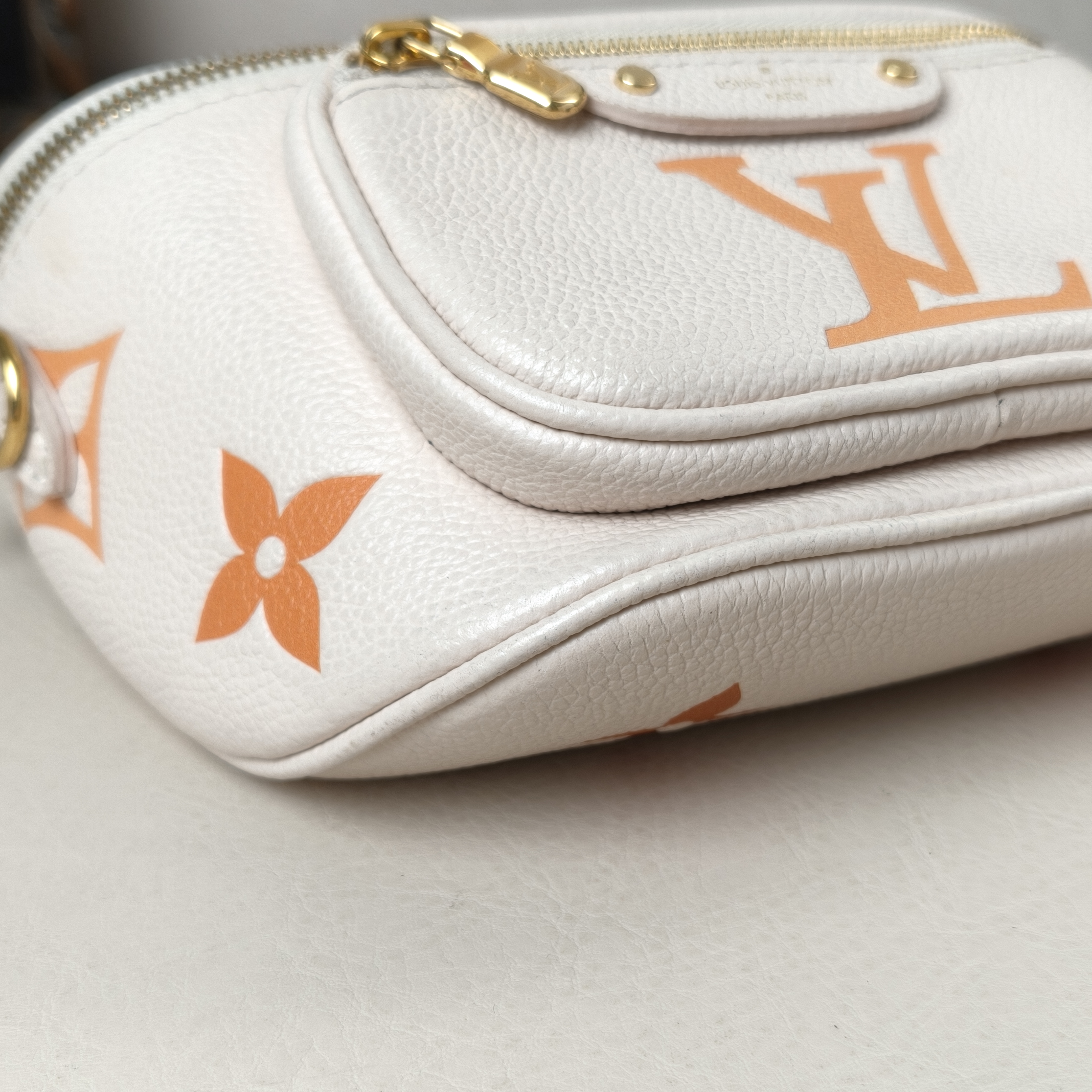 Louis Vuitton Belt Bag mini Beige Calfskin Microchip Edition · Two Straps · 17 × 9.5 × 12 cm — cover view 2 of 9