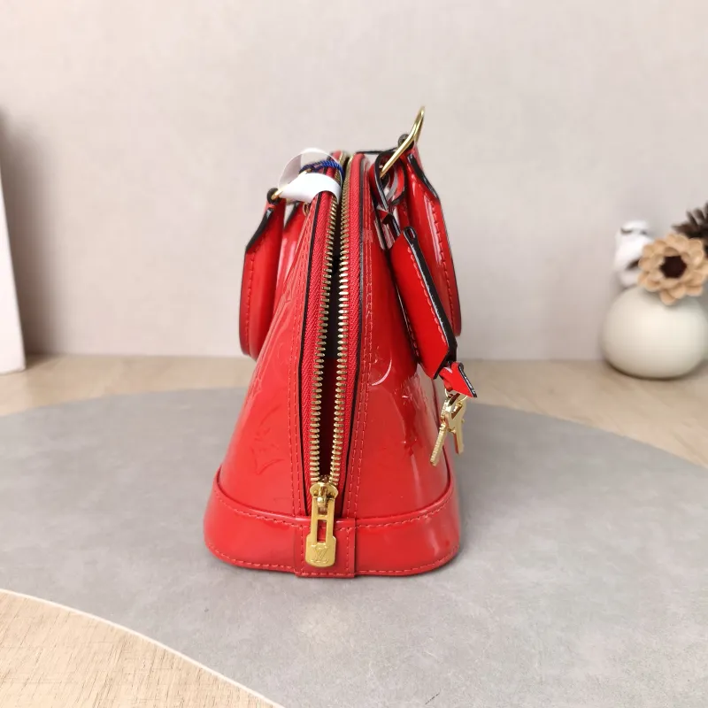 Louis Vuitton Crossbody Bag Alma BB Patent Leather BB 23.5 × 11.5 × 17.5 cm — detail view 11 of 11