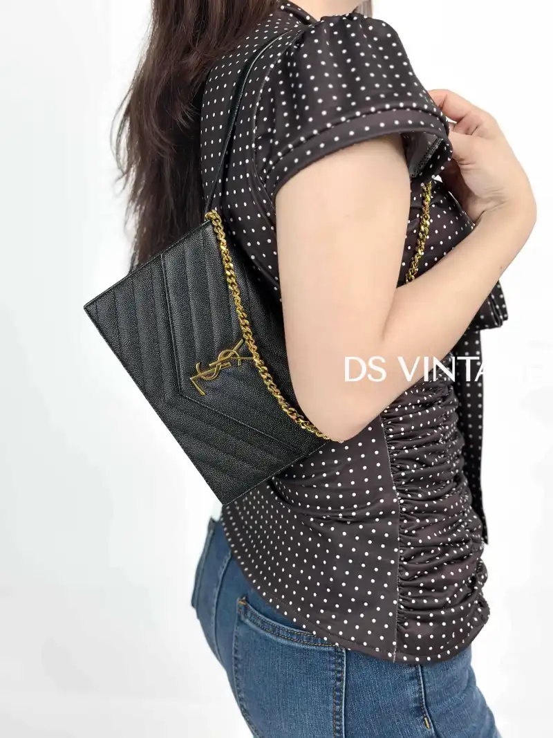 SAINT LAURENT Crossbody Bag CASSANDRE ENVELOPE Black Calfskin One Size22.5 × 4 × 14 cm — on-model view 2 of 2