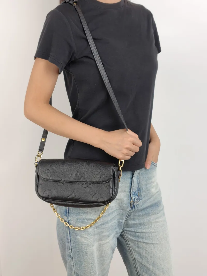 Louis Vuitton Crossbody Bag IVY Black Empreinte Embossed Calfskin Small 23.5 × 4.3 × 12 cm — on-model view 3 of 3