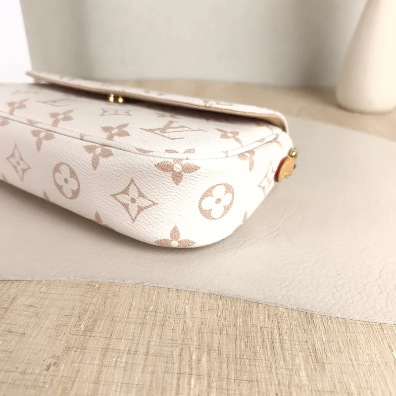 Louis Vuitton Crossbody Bag IVY · Beige PVC Small 23.5 × 4.3 × 12 cm — detail view 1 of 11