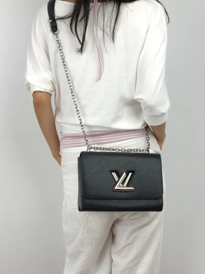 Louis Vuitton Crossbody Bag Twist Black Epi Embossed Calfskin Medium 23 × 9.5 × 17 cm — on-model view 3 of 3