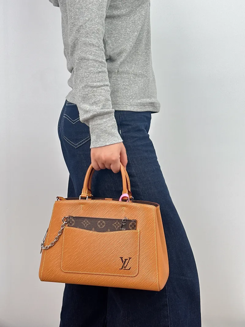 Louis Vuitton Crossbody Bag Marelle Tote Top Handle Bag Epi Embossed Calfskin Medium 30 × 13 × 21 cm — on-model view 1 of 2