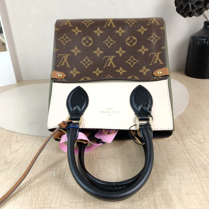 Louis Vuitton Top Handle Bag Fold Tote Colorblock PVC · Calfskin Small 20 × 18 × 22 cm — detail view 9 of 11