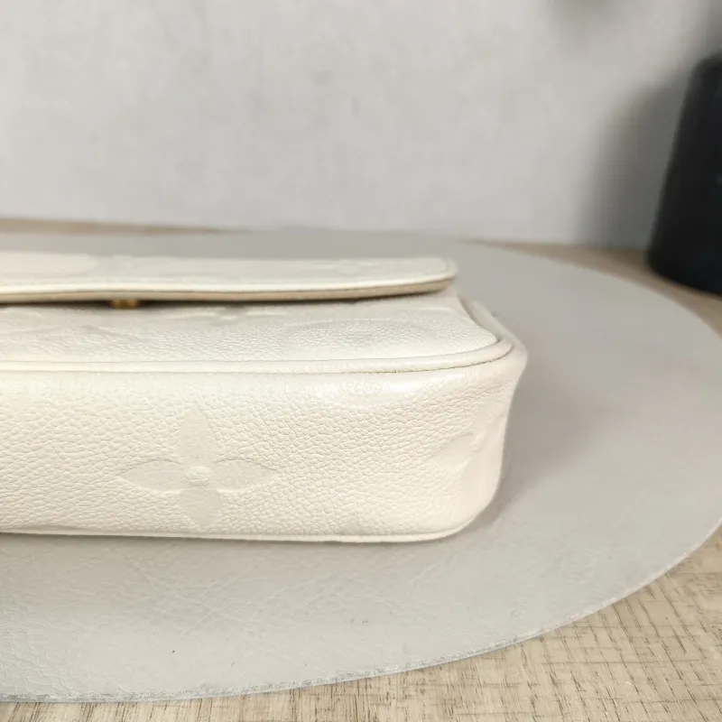 Louis Vuitton Crossbody Bag IVY White Monogram Empreinte Embossed Calfskin Small 23.5 × 4.3 × 12 cm — detail view 5 of 11