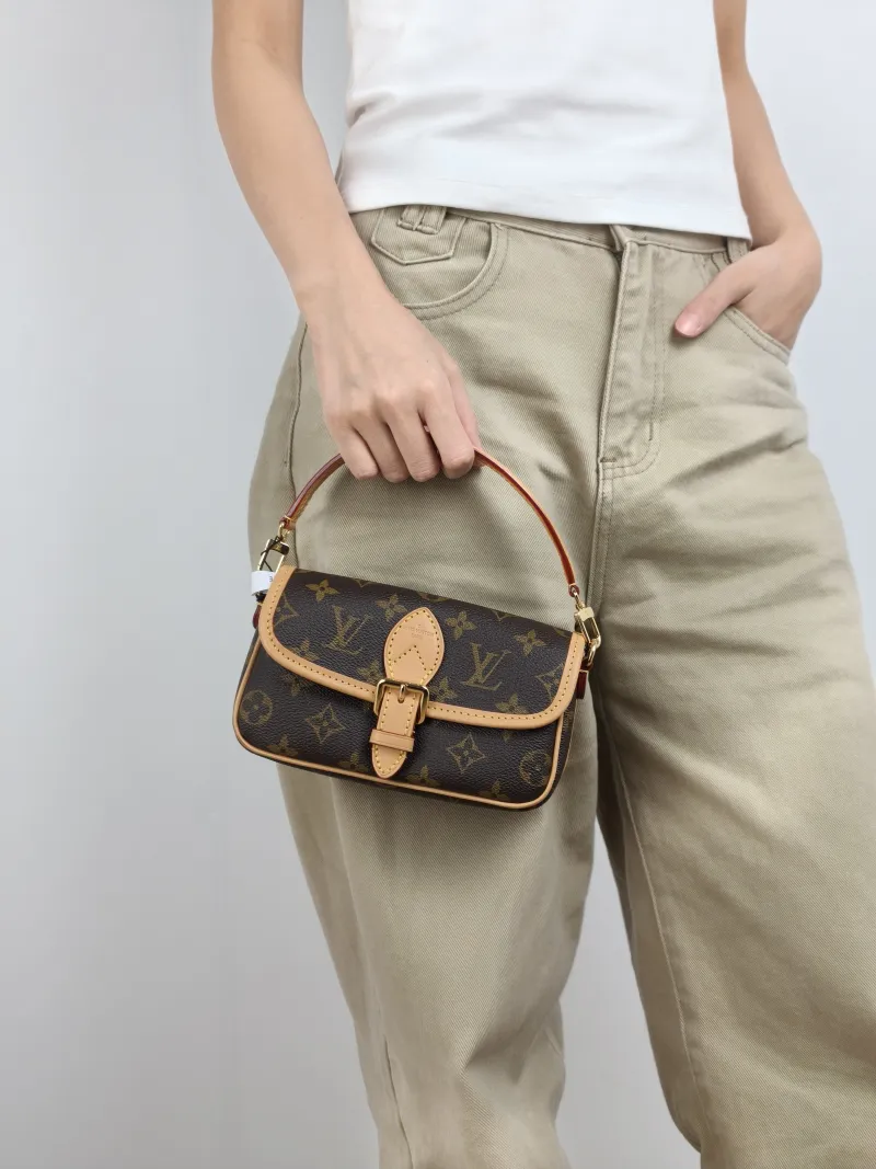 Louis Vuitton Crossbody Bag Diane Baguette Bag Monogram PVC nano 19 × 6 × 10.5 cm — on-model view 1 of 3