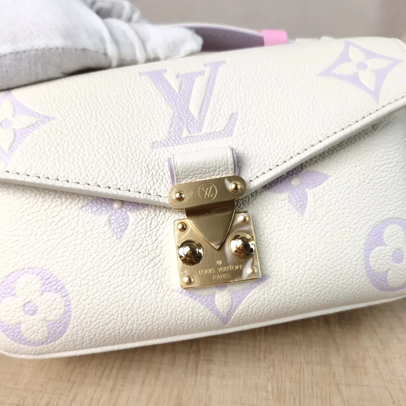 Louis Vuitton Crossbody Bag Pochette Métis East West White · Monogram Empreinte Embossed Calfskin Small 21.5 × 6 × 13.5 cm — detail view 10 of 14